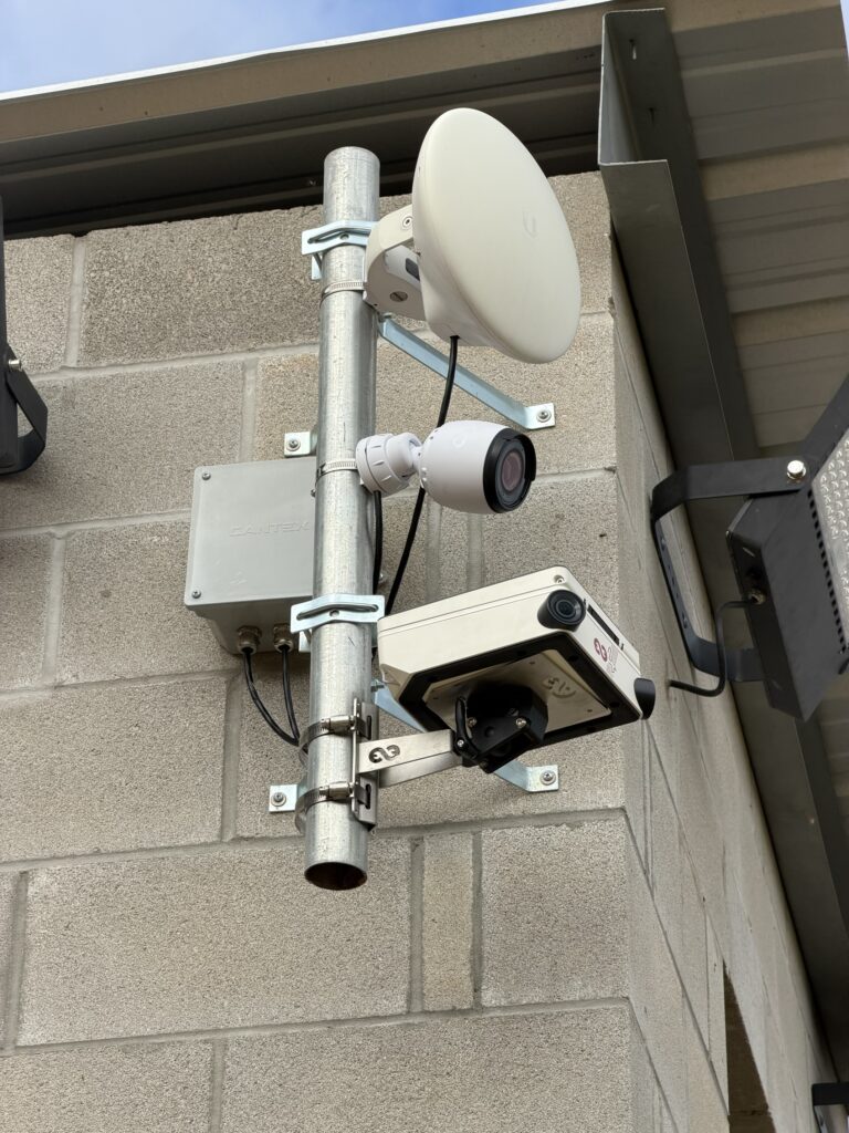multiple cameras mounted on a building
